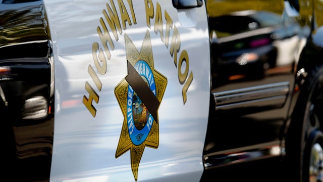 Black bands were placed across the California Highway Patrol badges on the sides of their vehicles, during memorial service  for CHP officer Kenyon Youngstrom, on Thursday September 13, 2012 in Vacaville, Ca. Youngstrom was shot during a traffic stop, nin 