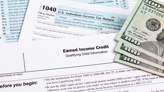 Earned income tax credit form. Tax credit, deduction and tax return concept. 