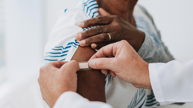 Doctor giving a vaccine 