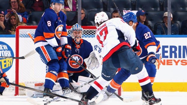 Dylan Strome #17 of the Washington Capitals scores against Ilya Sorokin #30 of the New York Islanders at 7:52 of the second period at UBS Arena on April 15, 2025 in Elmont, New York. 