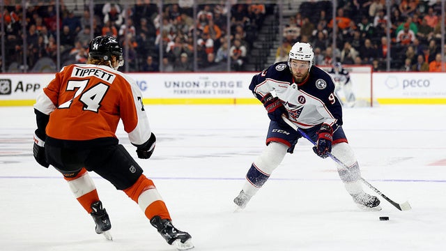 Ivan Provorov #9 of the Columbus Blue Jackets controls the puck against Owen Tippett #74 of the Philadelphia Flyers during the first period at the Wells Fargo Center on April 15, 2025 in Philadelphia. 